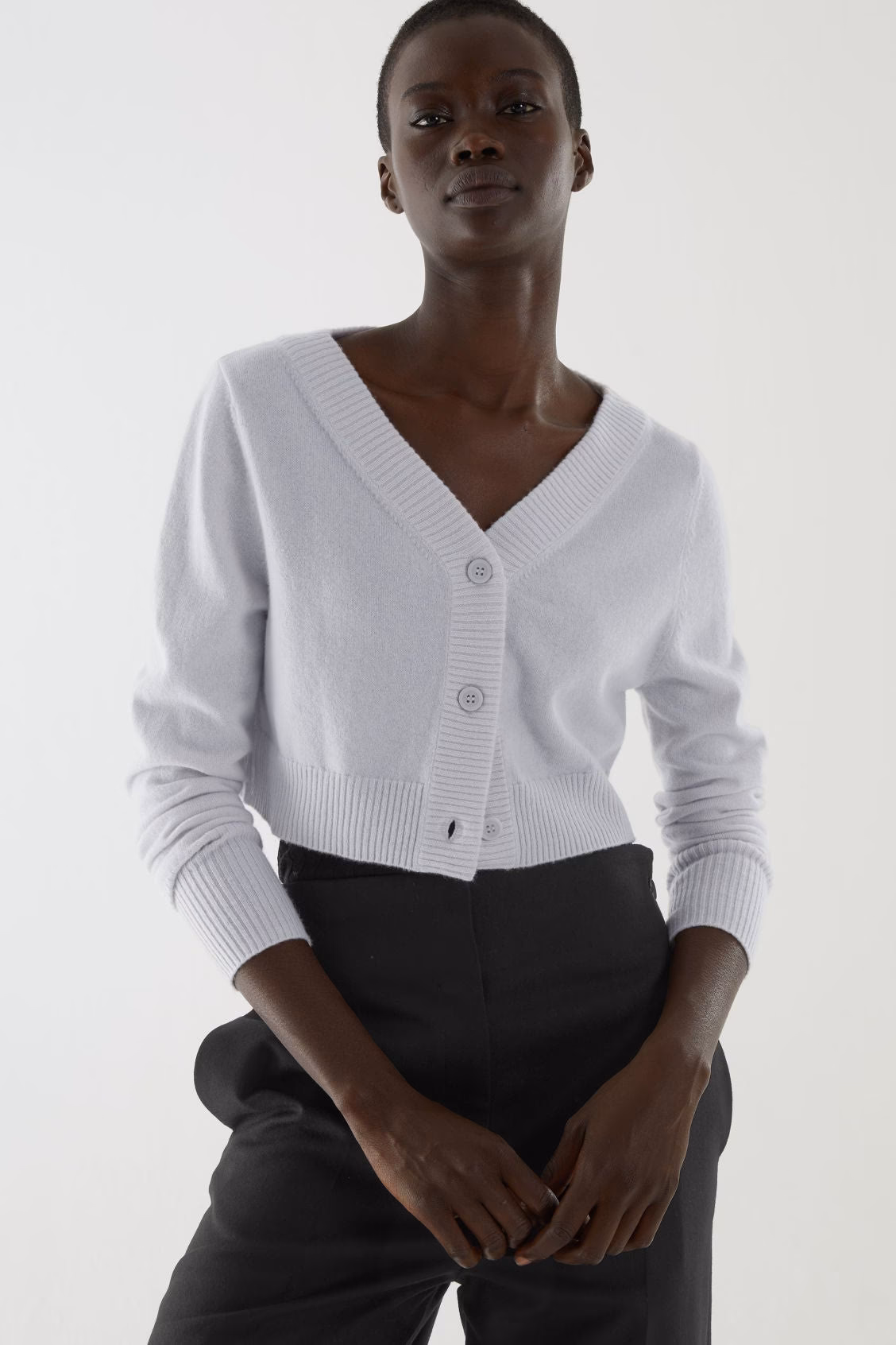 How much is a cashmere sweater at Saks OFF 5TH?