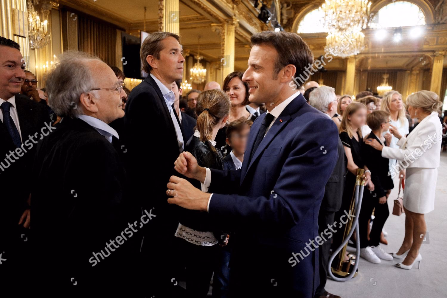 Where does Jean-Michel Macron live today?