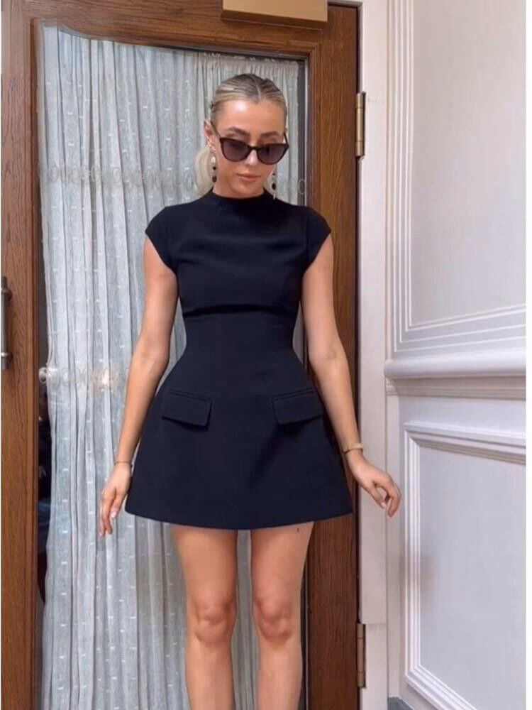 What is a short designer dress?